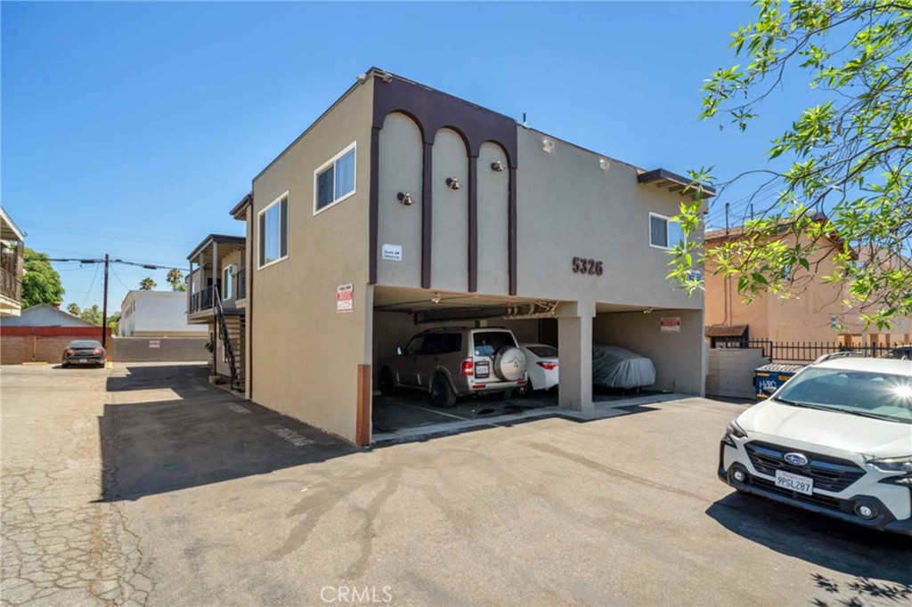 5326 Cahuenga Boulevard North Hollywood, CA 91601 - Photo 2 of 15 a car parked in front of a house