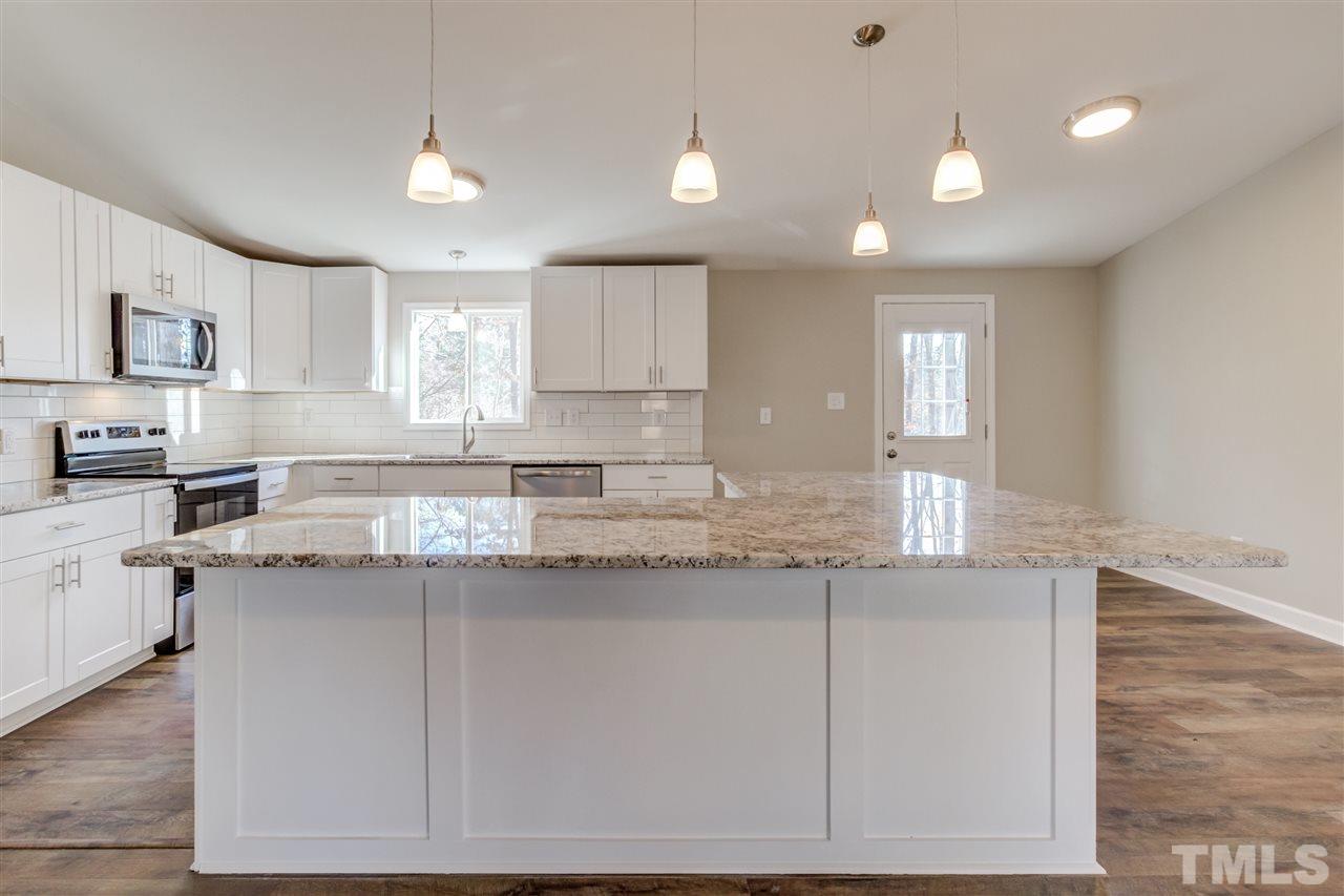 7920 Mourning Dove Road Raleigh, NC 27615 - Photo 5 of 30