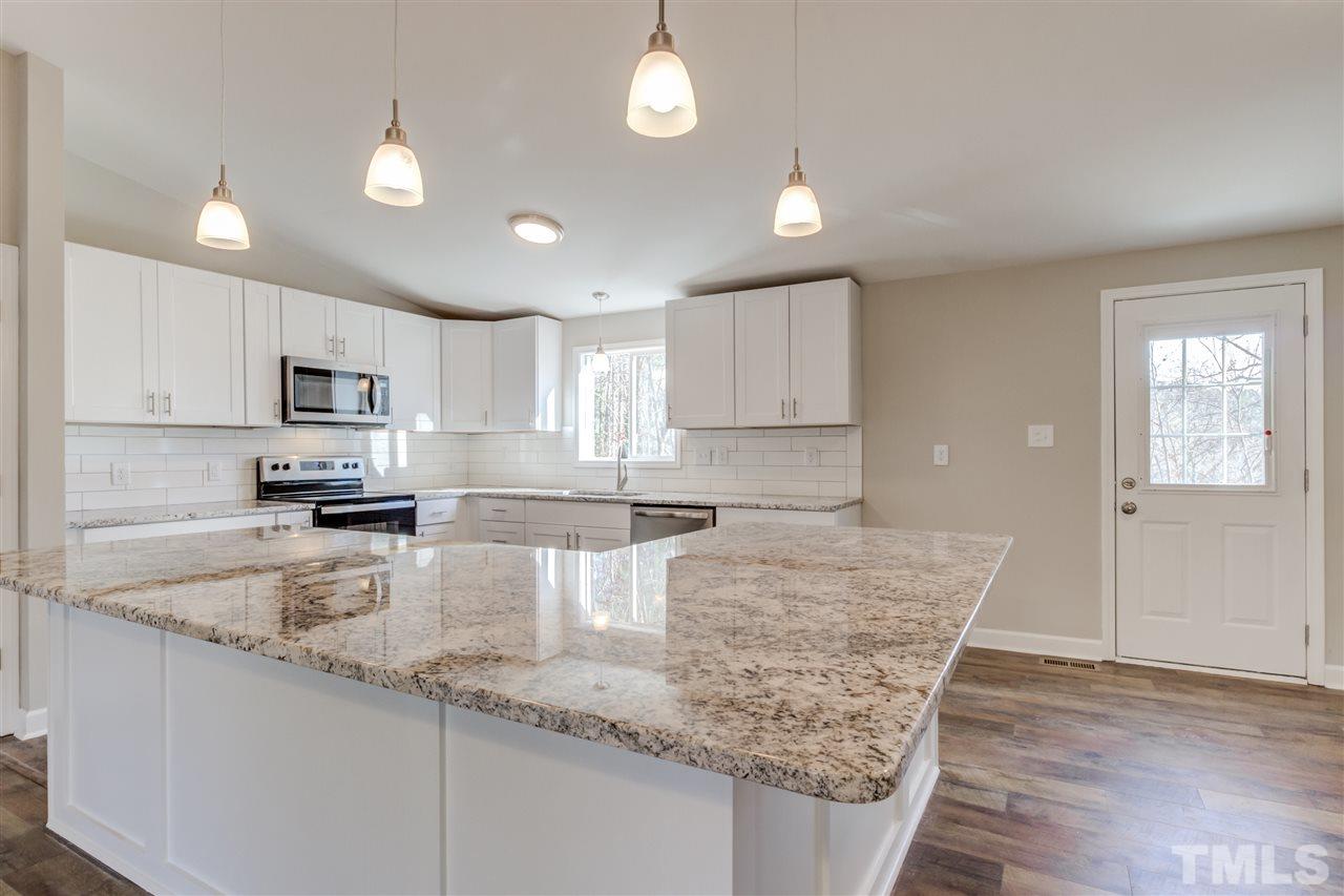 7920 Mourning Dove Road Raleigh, NC 27615 - Photo 6 of 30