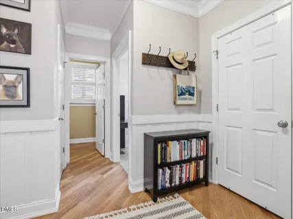 a bedroom with a bed and a desk