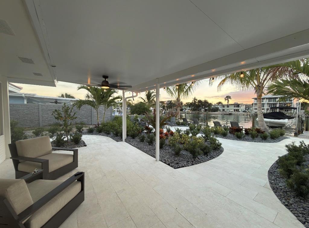 12350 4th Street East Treasure Island, FL 33706 - Photo 16 of 16 a building outdoor space with patio furniture and potted plants