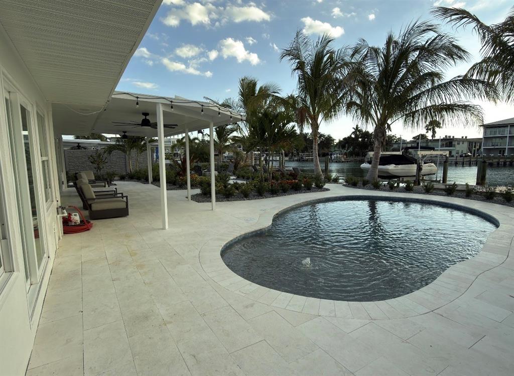12350 4th Street East Treasure Island, FL 33706 - Photo 2 of 16 a view of swimming pool