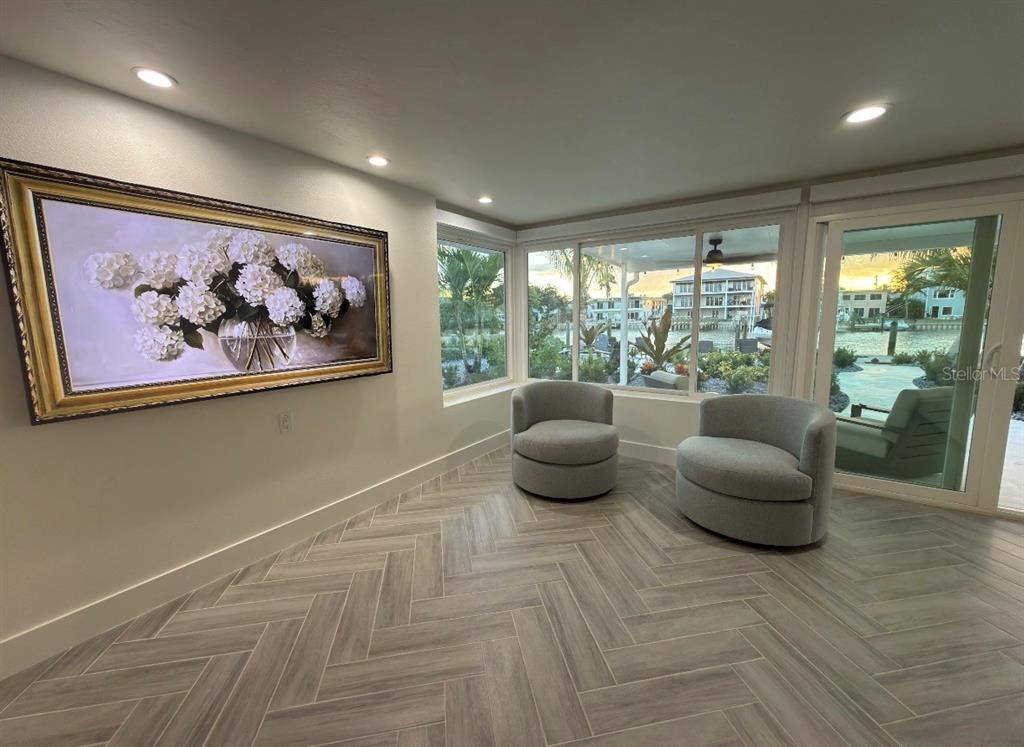 12350 4th Street East Treasure Island, FL 33706 - Photo 6 of 16 a room with furniture and a large window