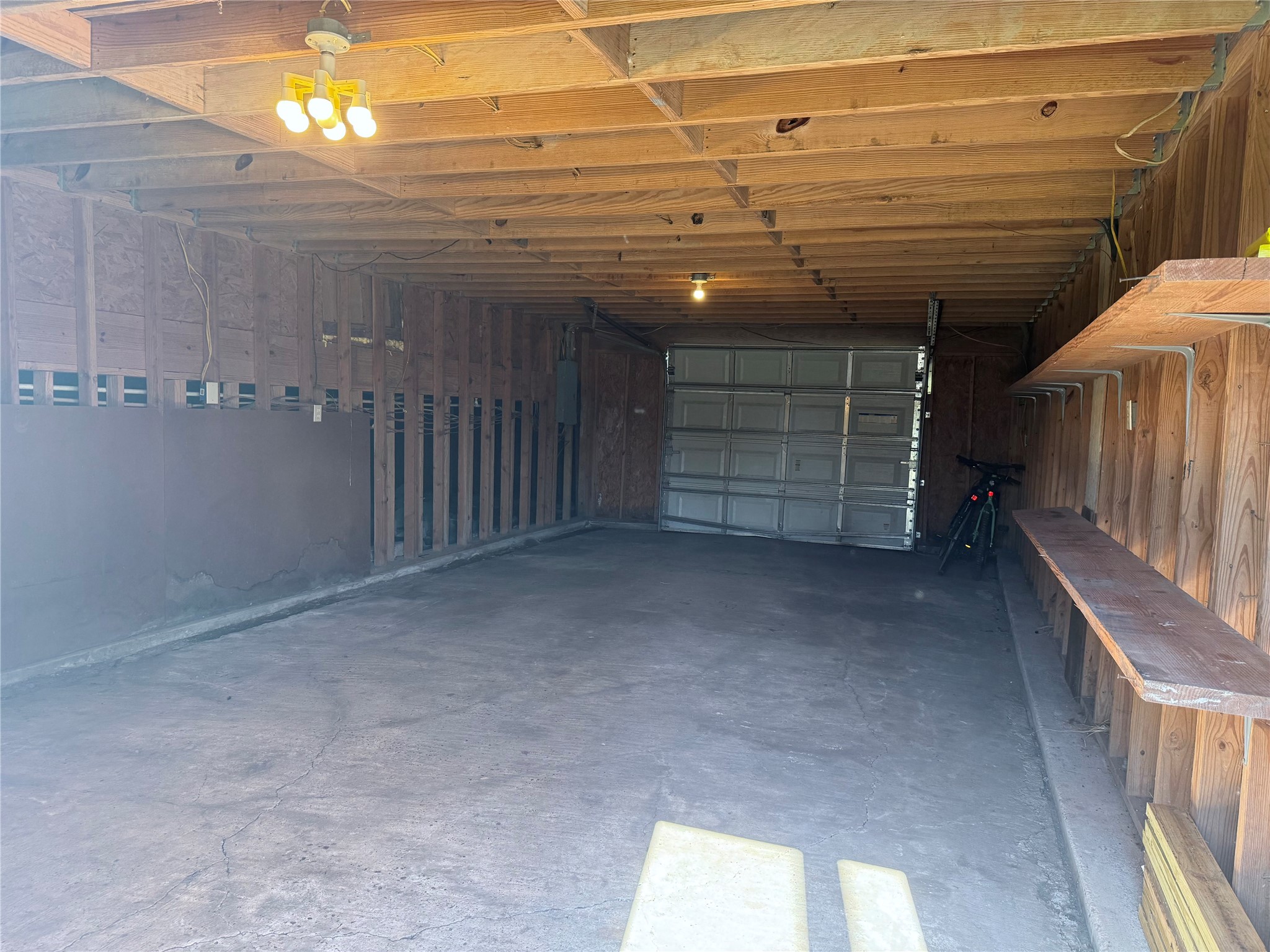 14005 Alles House Road Santa Fe, TX 77510 - Photo 5 of 13 oversized one car garage with plenty of space for tools