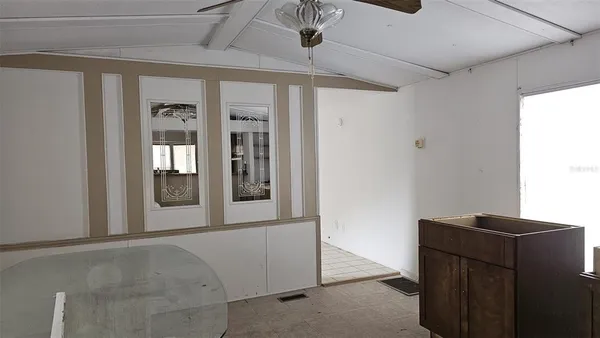 a view of livingroom with washer and dryer
