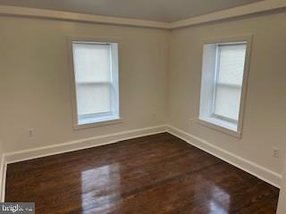264 Maple Street Ambler, PA 19002 - Photo 5 of 9 a view of an empty room with wooden floor and a window