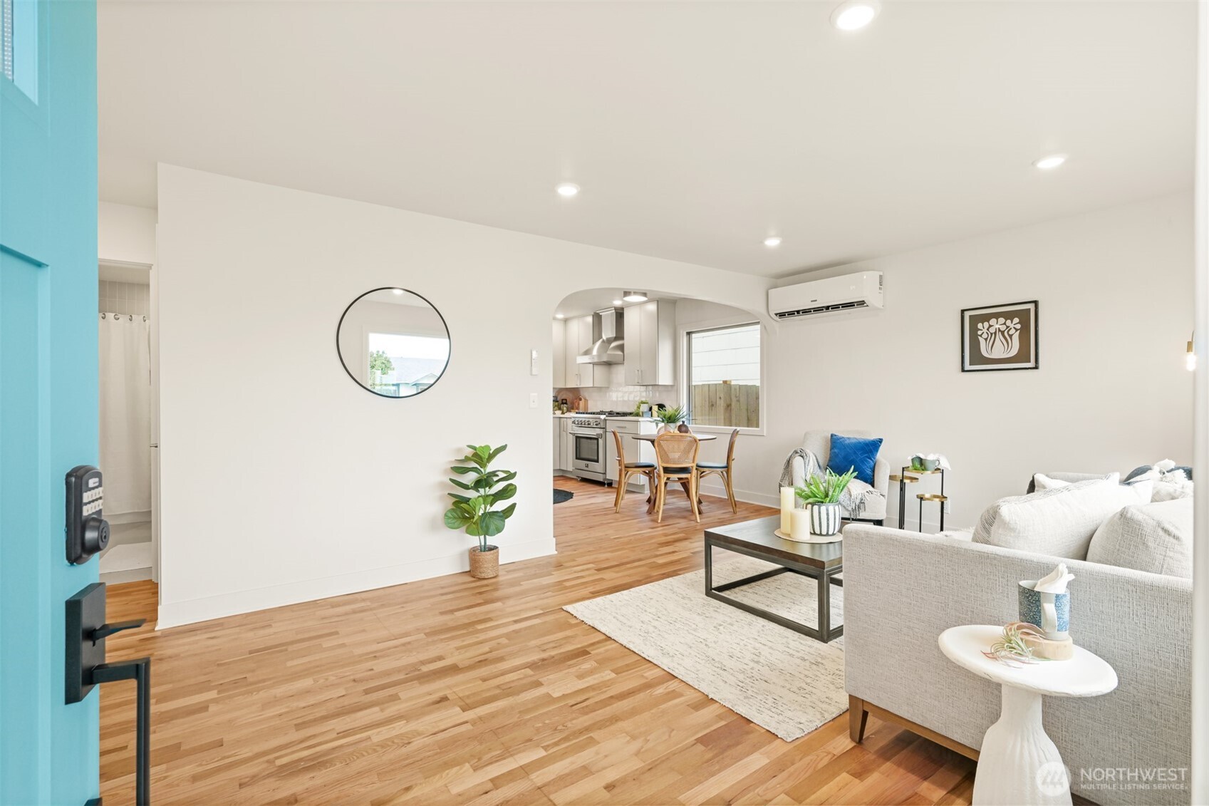2111 Franklin Street Bellingham, WA 98225 - Photo 6 of 39 a living room with furniture and a wooden floor