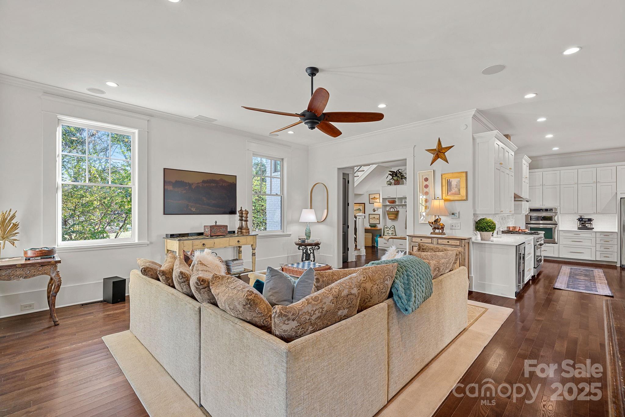 206 Meadowbrook Road Charlotte, NC 28211 - Photo 16 of 48 a living room with furniture flat screen tv and window