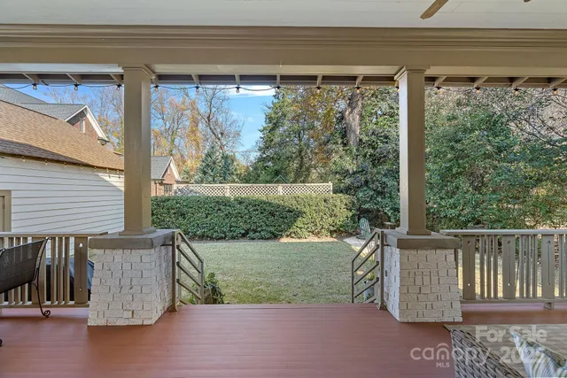 a view of a chair and table in the balcony