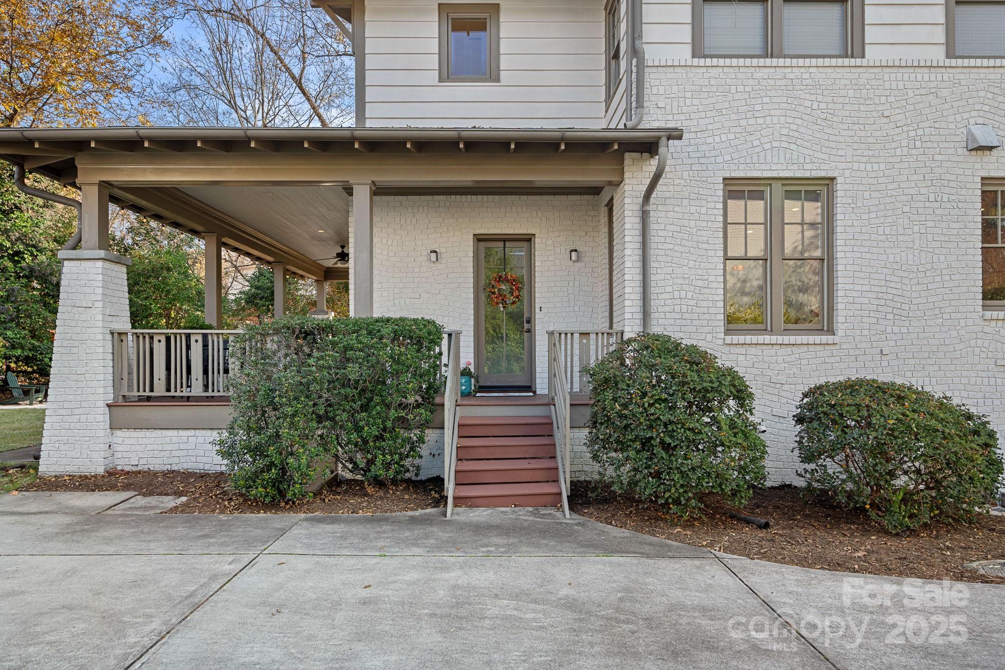 206 Meadowbrook Road Charlotte, NC 28211 - Photo 42 of 48 a view of a house with large windows