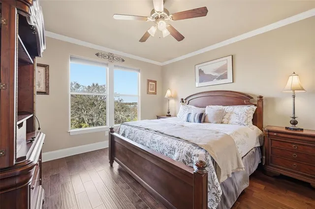 a kitchen with granite countertop a refrigerator stove and microwave