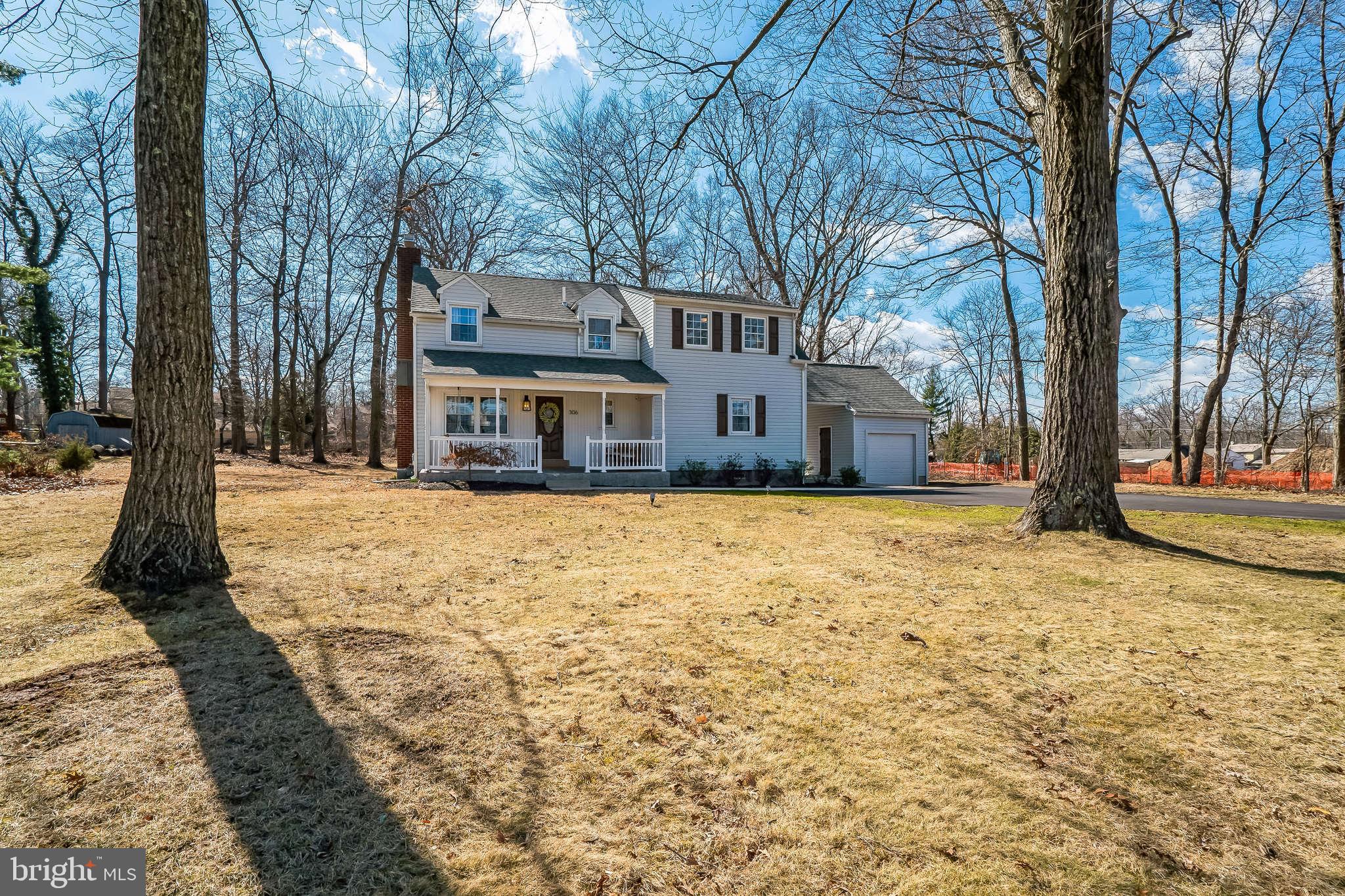 306 Cowpath Road Lansdale, PA 19446 - Photo 2 of 30 a street view covered with snow