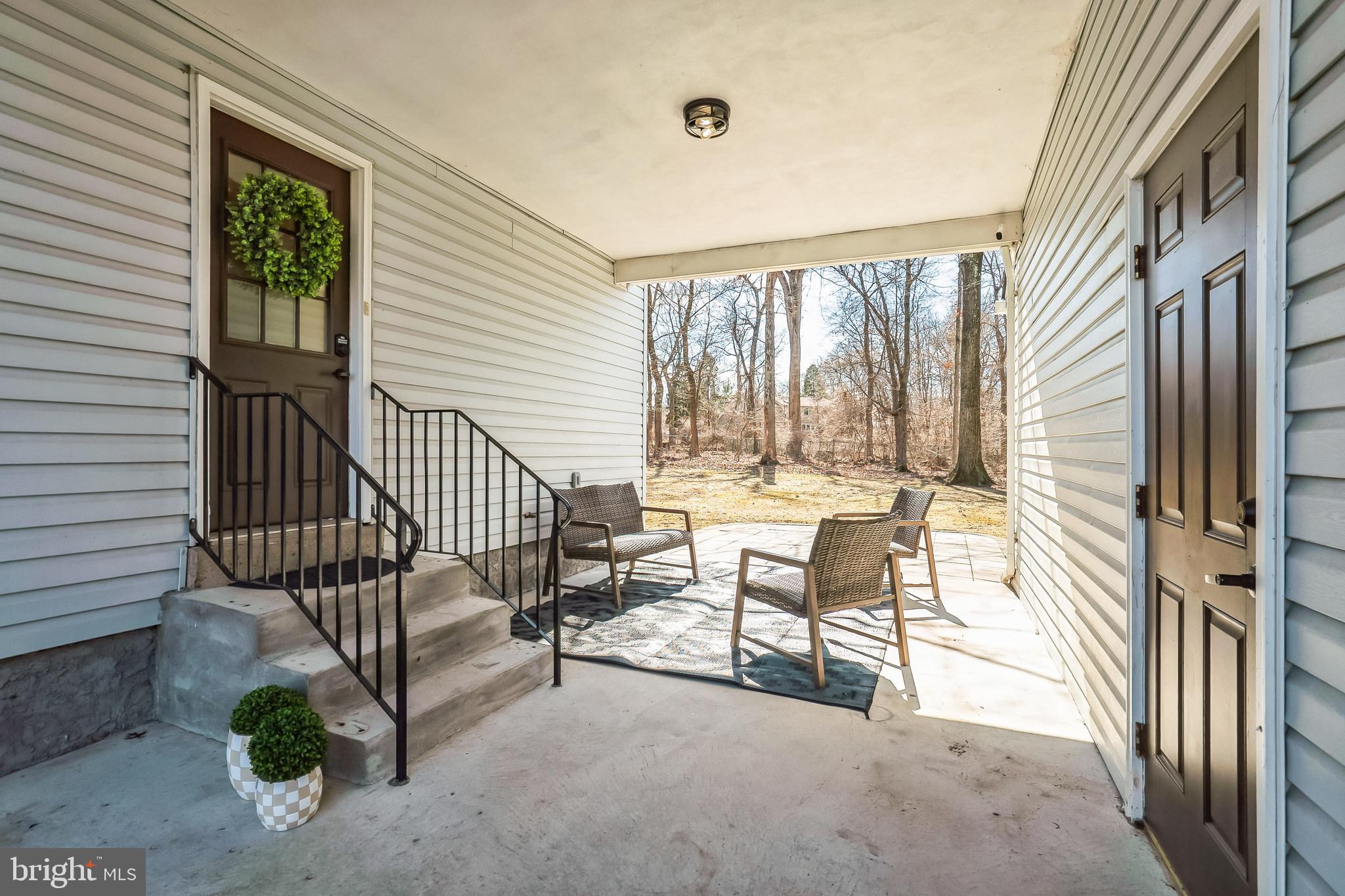 306 Cowpath Road Lansdale, PA 19446 - Photo 27 of 30 a view of a balcony with chairs and iron fence