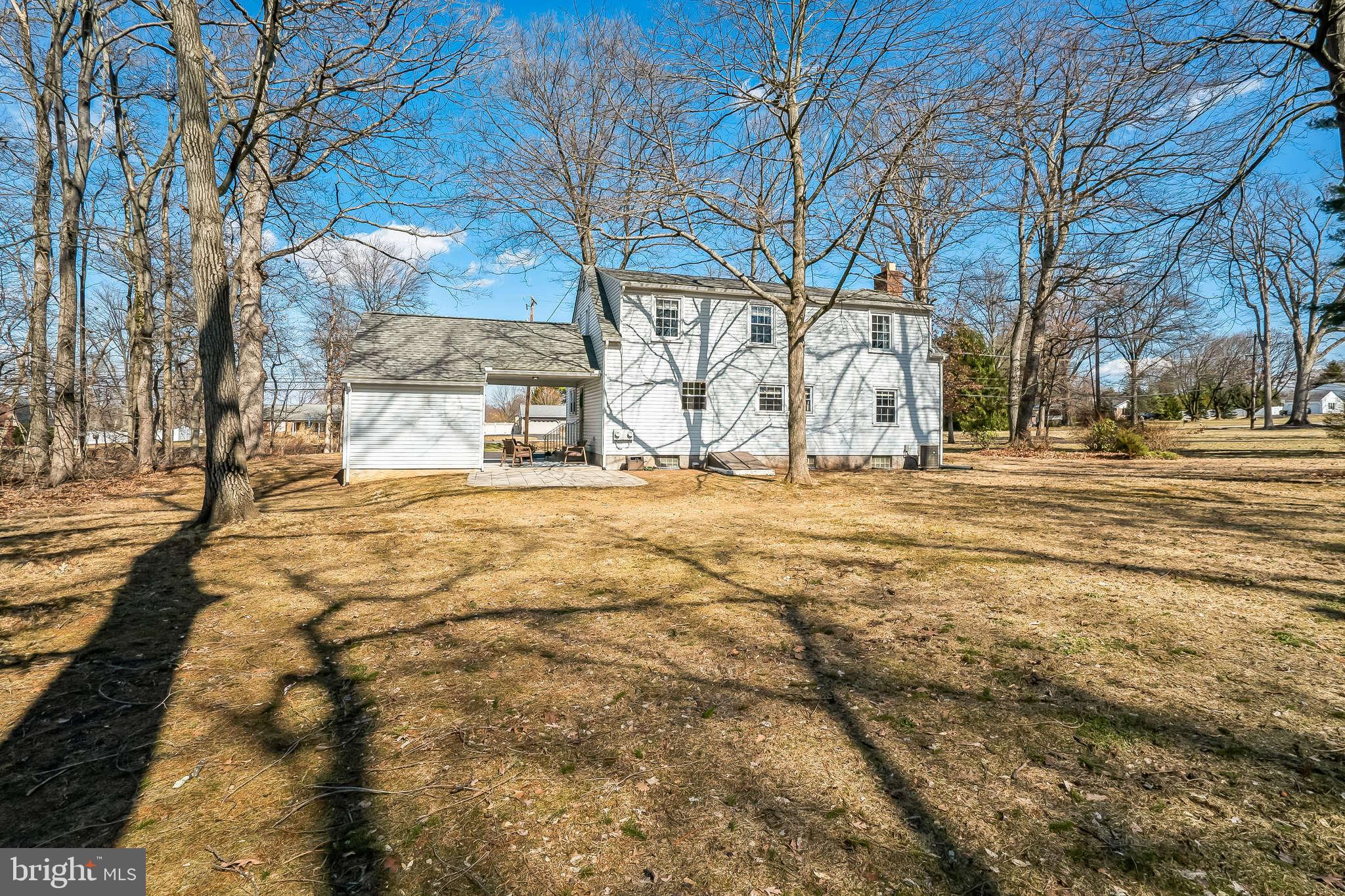 306 Cowpath Road Lansdale, PA 19446 - Photo 29 of 30 a big yard with trees in the background