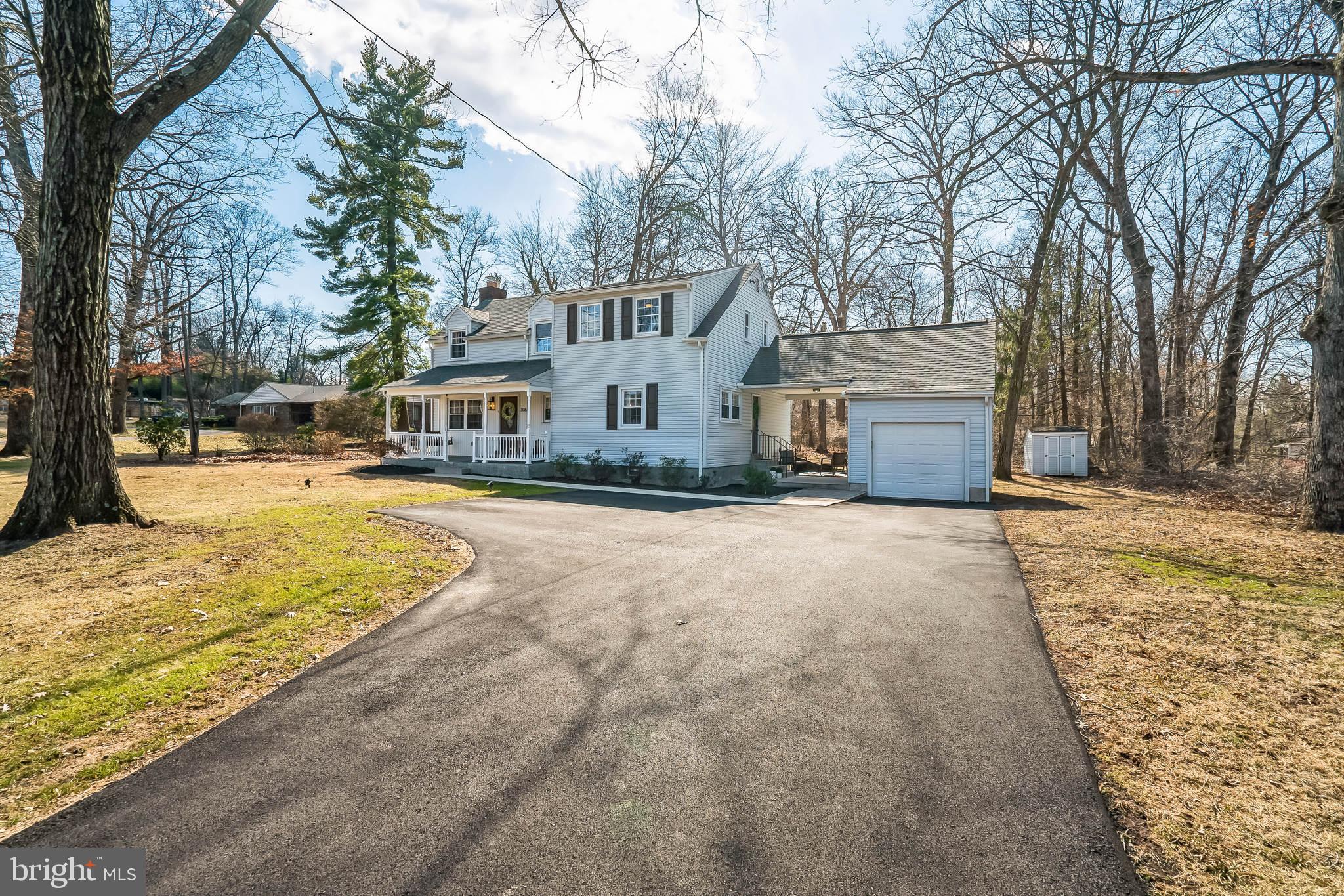 306 Cowpath Road Lansdale, PA 19446 - Photo 3 of 30 a view of large house with a yard covered with snow
