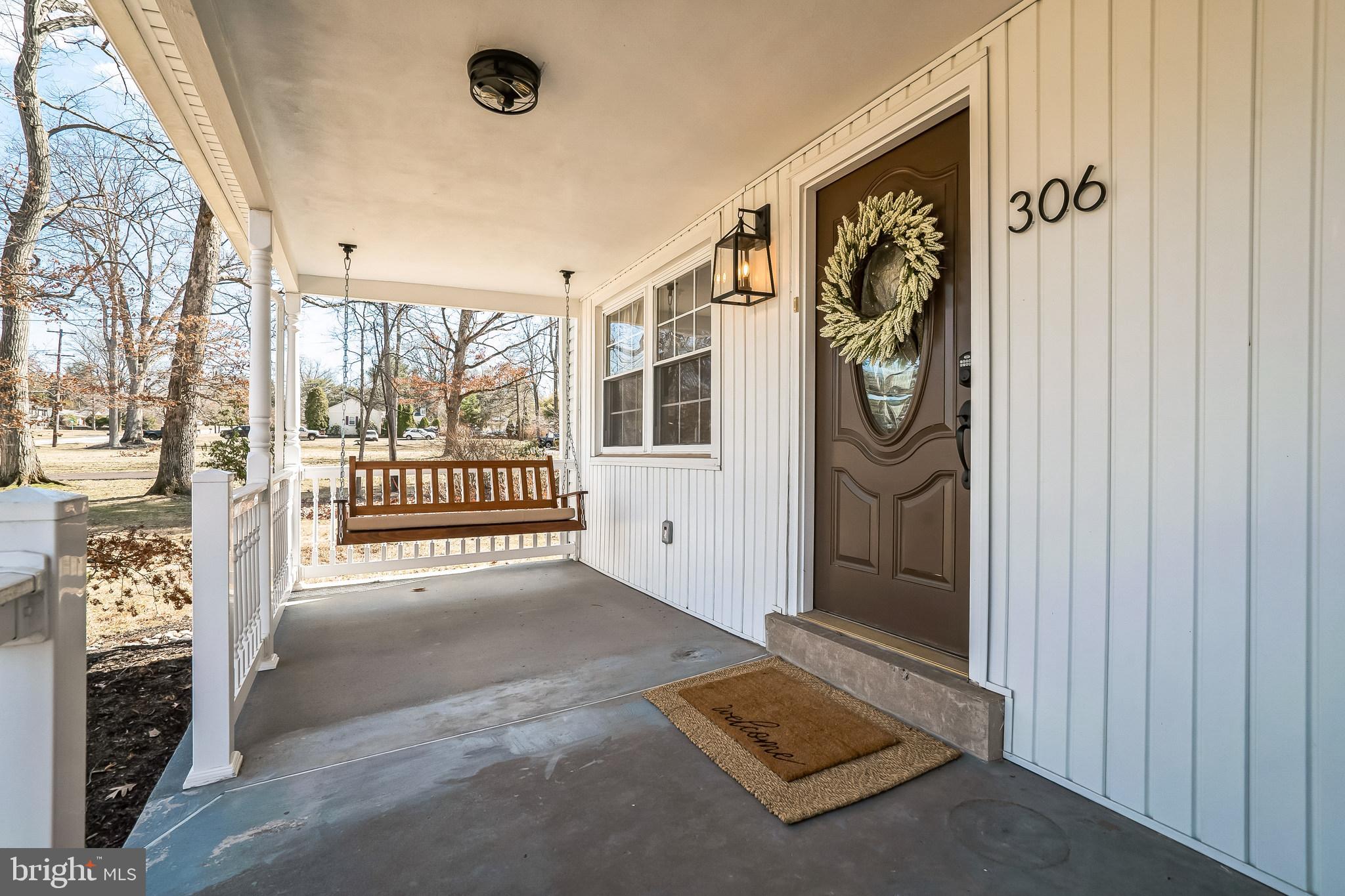 306 Cowpath Road Lansdale, PA 19446 - Photo 4 of 30 a view of a hallway with windows