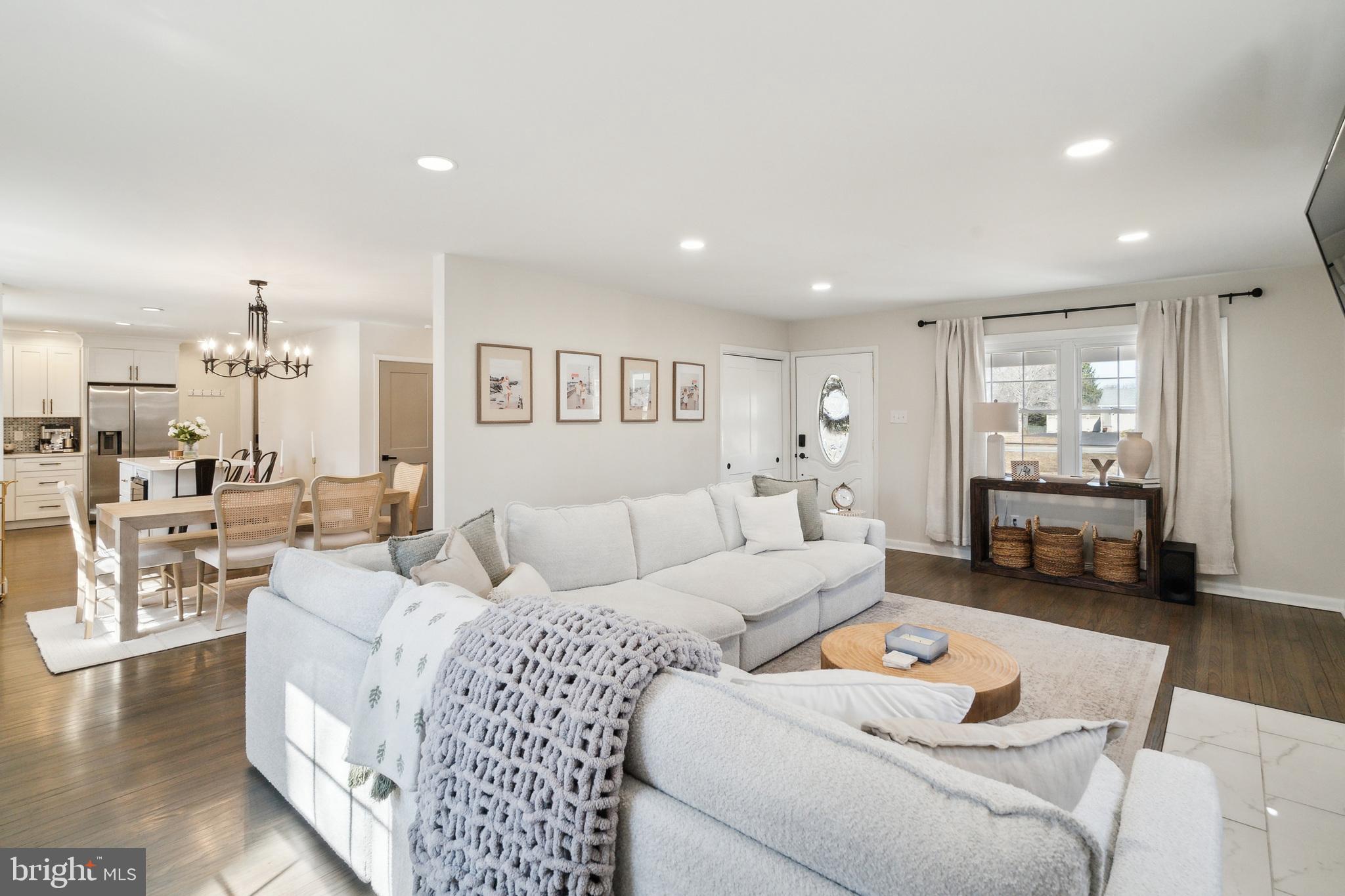 306 Cowpath Road Lansdale, PA 19446 - Photo 8 of 30 a living room with furniture and a large mirror