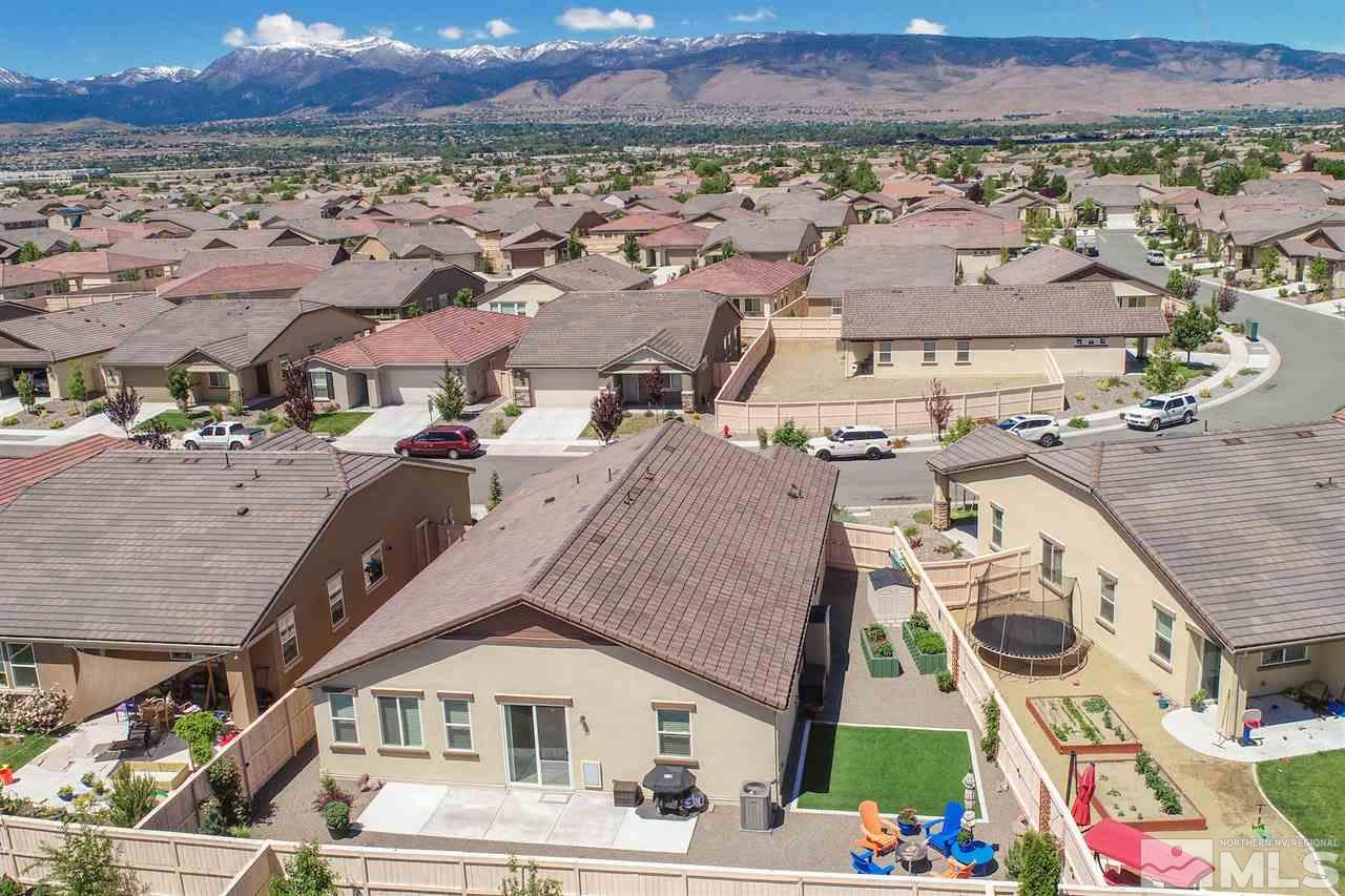 10120 Culiacan Pass Trail Reno, NV 89521 - Photo 27 of 33 an aerial view of residential houses with outdoor space and parking