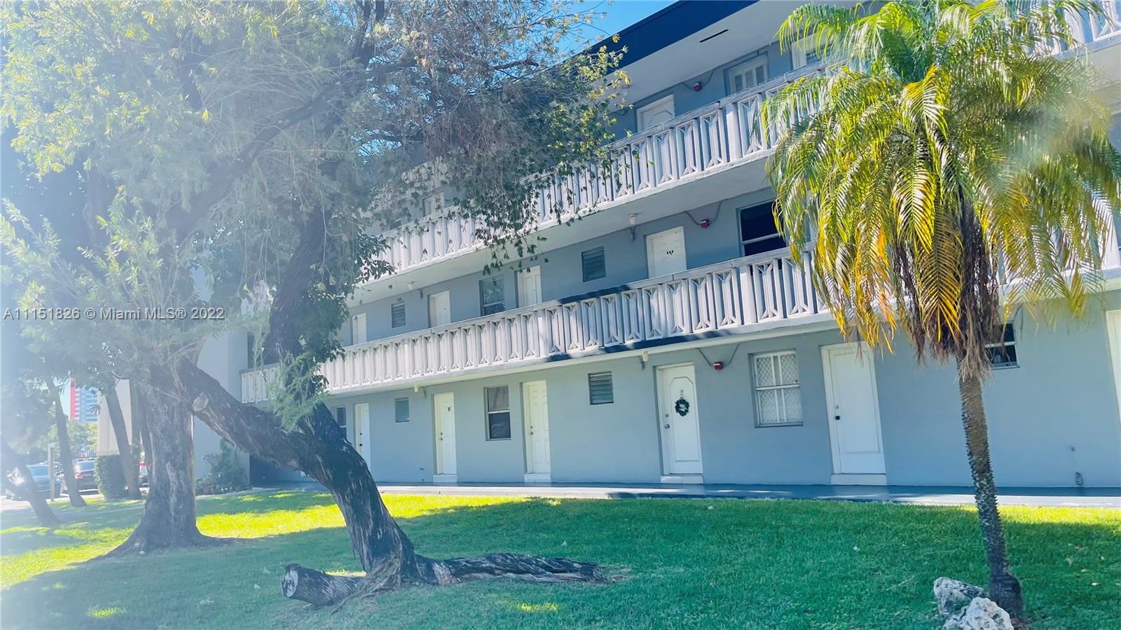a view of an house with a swimming pool