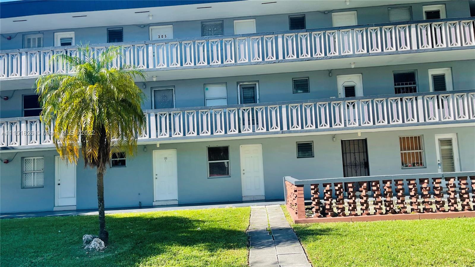 Second Forum Condominium North Miami Beach, FL 33179 - Photo 2 of 12 a view of a house with a yard