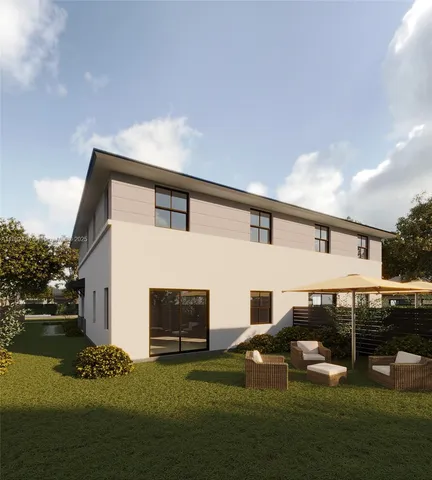 a kitchen with a table and chairs in it