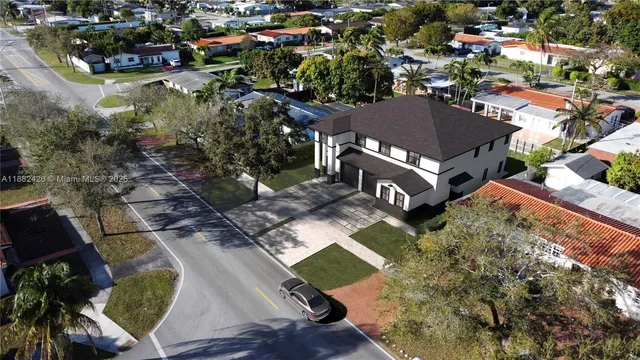 a view of a brick wall in front of building