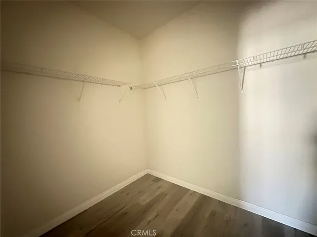 a view of a room with an empty walk in closet