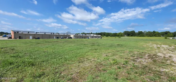 a view of an outdoor space and a yard