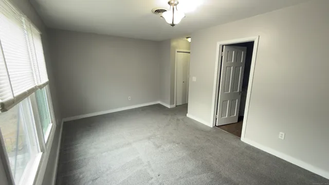 an empty room with a window