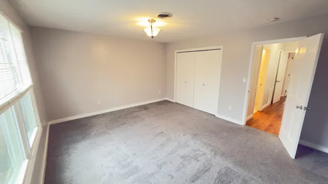 a view of empty room with a window