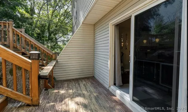 a view of a balcony with an outdoor space