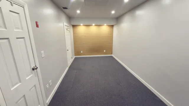 a view of hallway with shower