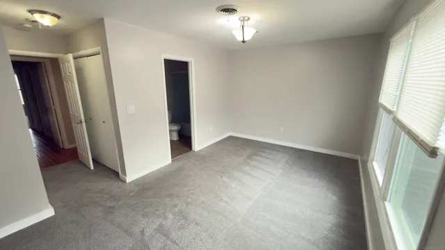 a view of a livingroom with a staircase
