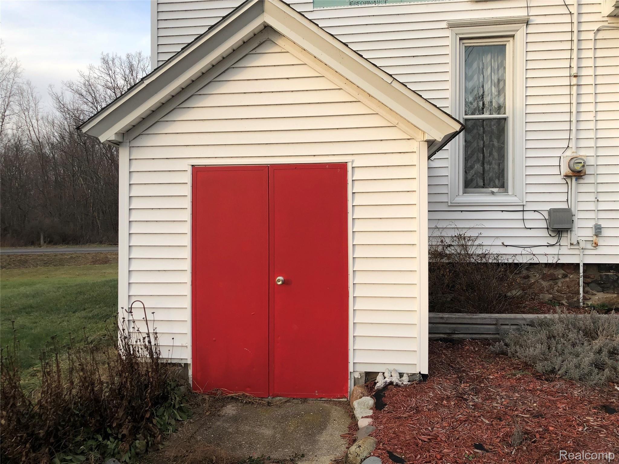 6438 East Bennington Road Durand, MI 48429 - Photo 26 of 27 Basement Has A Walk Up/Out Entrance!