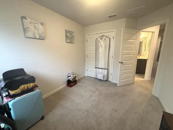 a view of room with entryway and stairs