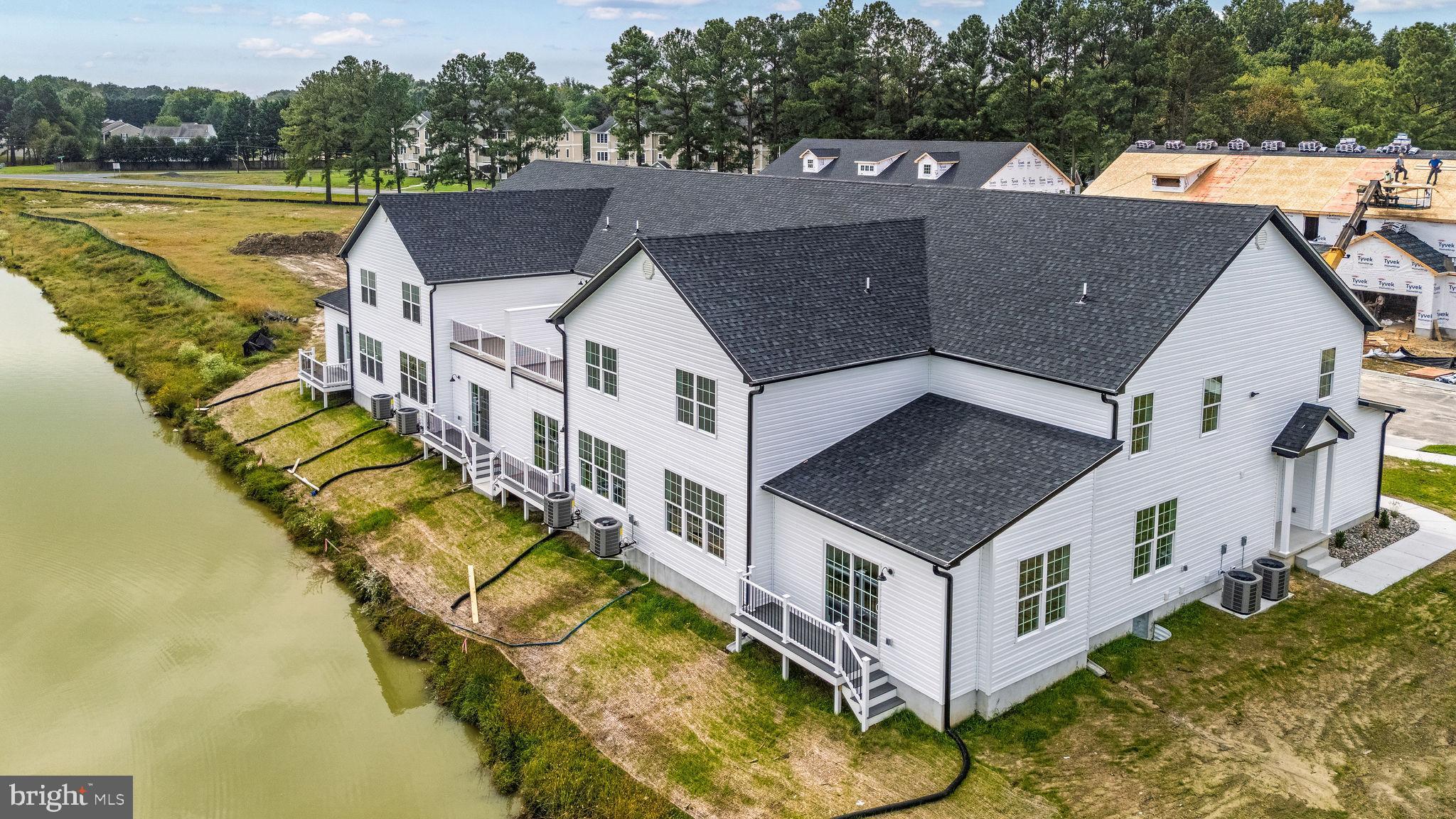 3 Valhalla Court Dover, DE 19904 - Photo 12 of 57 an aerial view of residential houses with yard and ocean view
