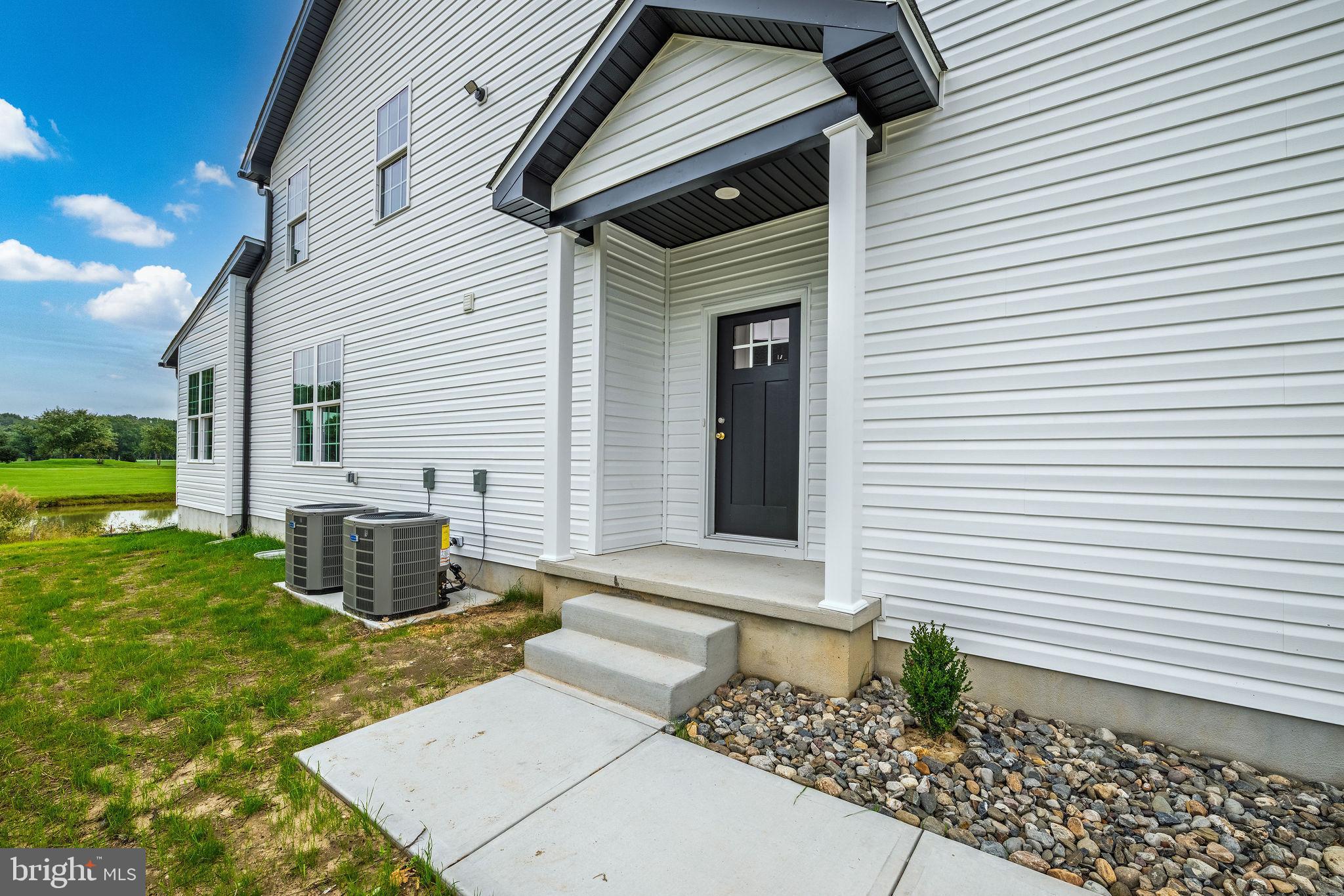 3 Valhalla Court Dover, DE 19904 - Photo 14 of 57 a view of a house with backyard and sitting area