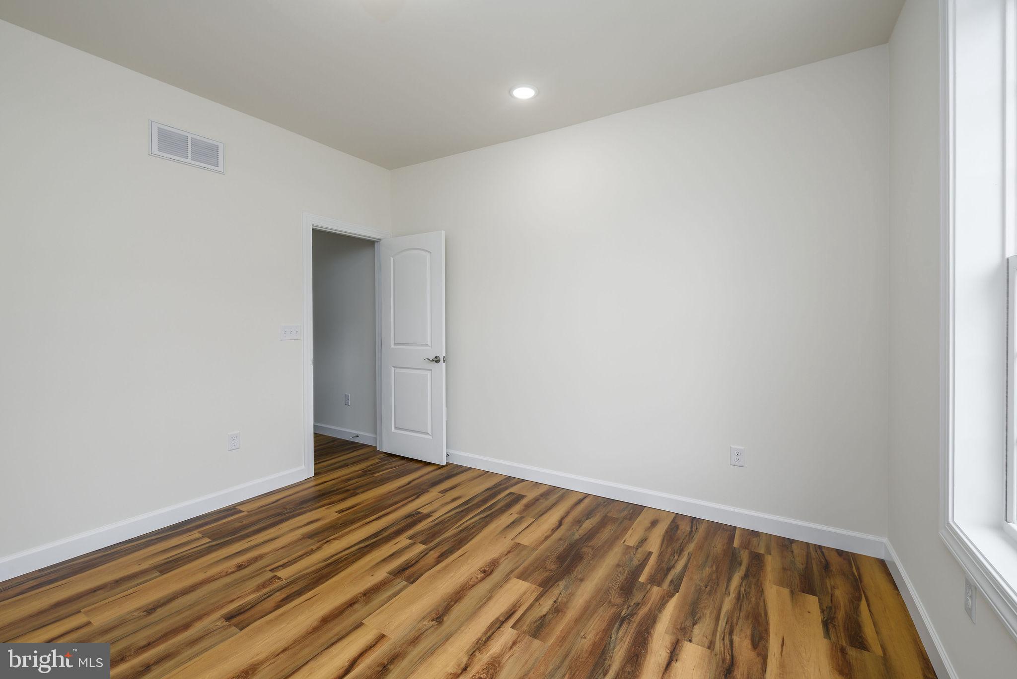 3 Valhalla Court Dover, DE 19904 - Photo 17 of 57 a view of room with wooden floor