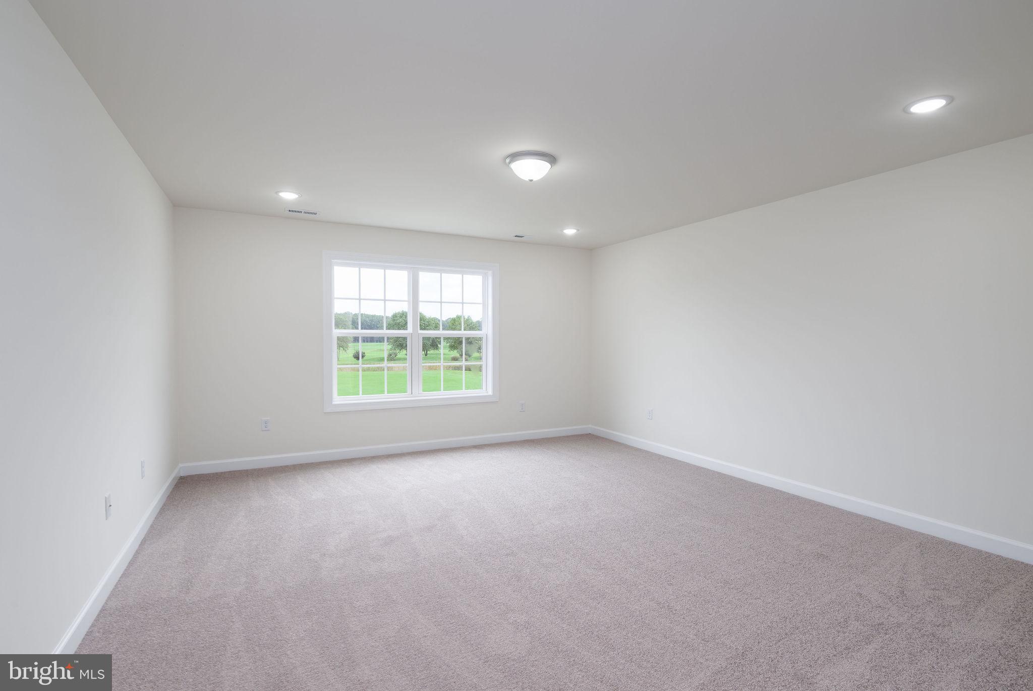 3 Valhalla Court Dover, DE 19904 - Photo 40 of 57 a view of a big room with windows and chandelier fan