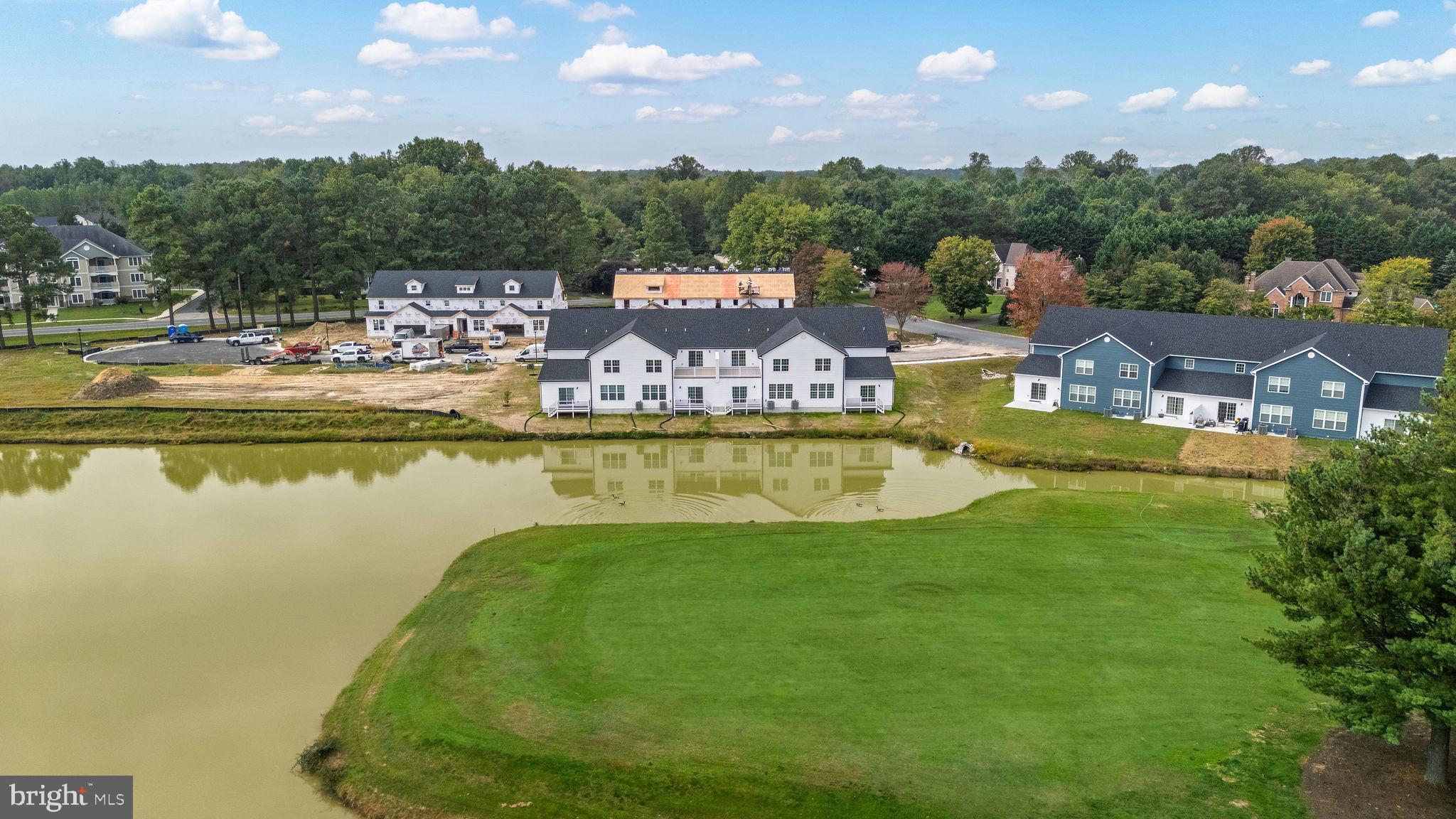3 Valhalla Court Dover, DE 19904 - Photo 7 of 57 a view of a swimming pool with a garden