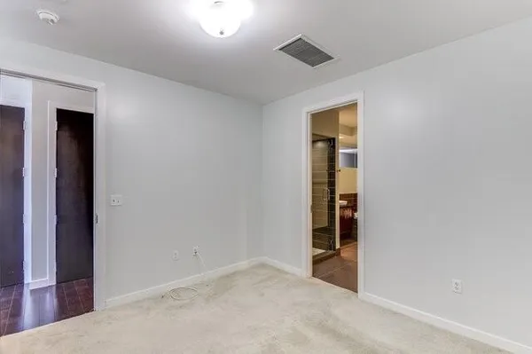 a kitchen with microwave cabinets and stove top oven