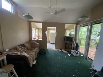 21 1/2 West Sutton Road Sutton, MA 01590 - Photo 11 of 12 a bed sitting in a room next to a window