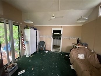21 1/2 West Sutton Road Sutton, MA 01590 - Photo 9 of 12 a view of a livingroom with furniture and a floor to ceiling window