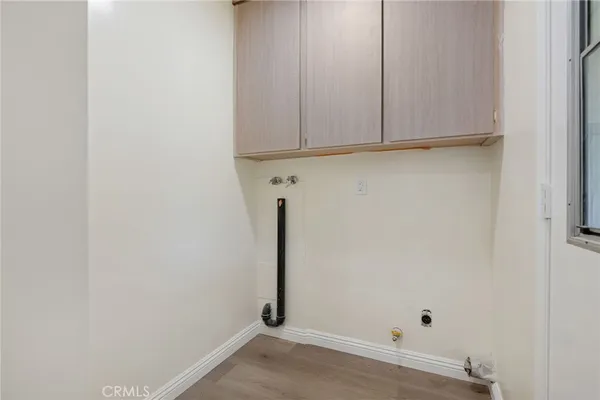 a view of small space with wooden floor
