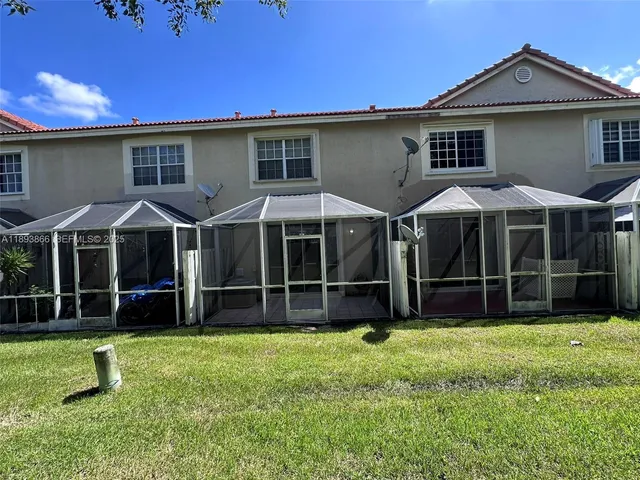 a view of a lake with a house