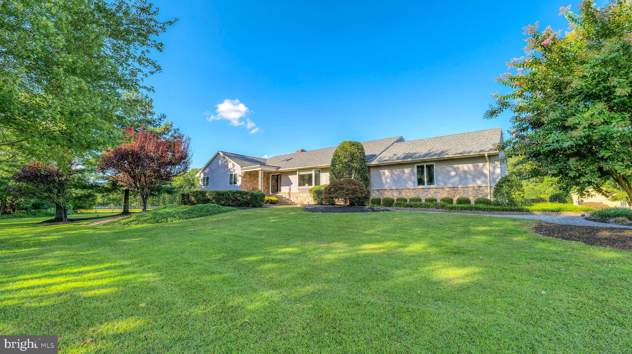 272 Hartford Road Medford, NJ 08055 - Photo 1 of 37 a front view of a house with a yard