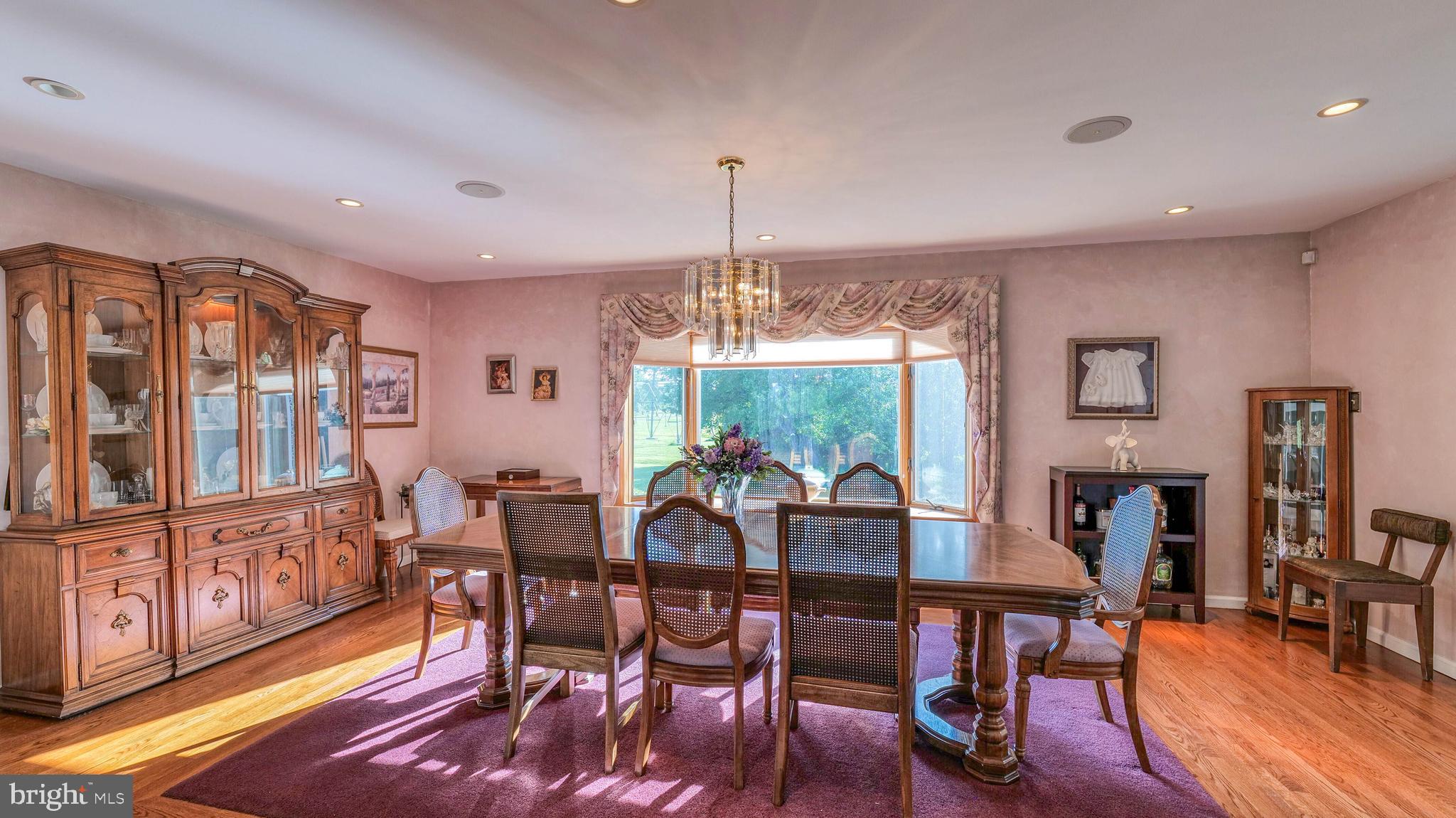 272 Hartford Road Medford, NJ 08055 - Photo 11 of 37 a view of a dining room with furniture window and wooden floor