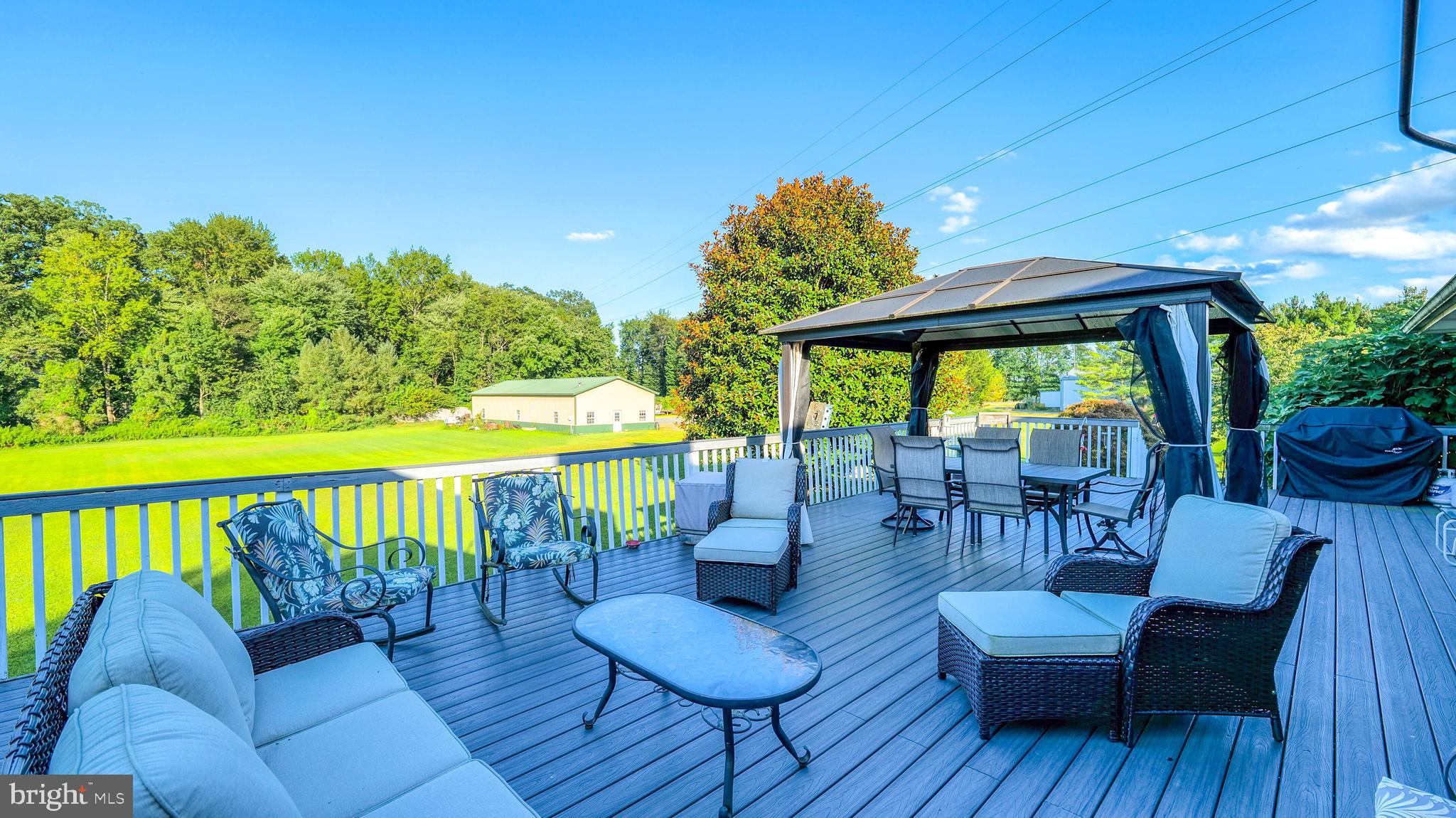 272 Hartford Road Medford, NJ 08055 - Photo 28 of 37 a view of a chair and tables in the patio