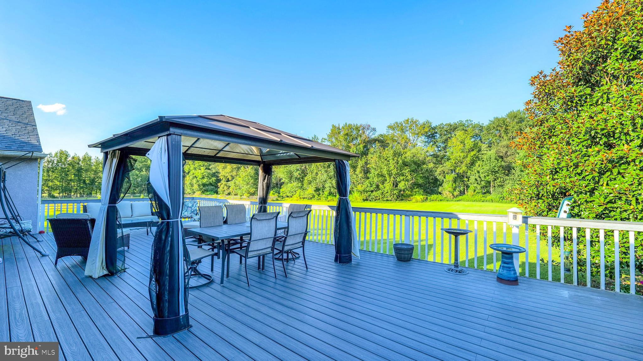 272 Hartford Road Medford, NJ 08055 - Photo 29 of 37 a view of a patio with a table chairs and a patio