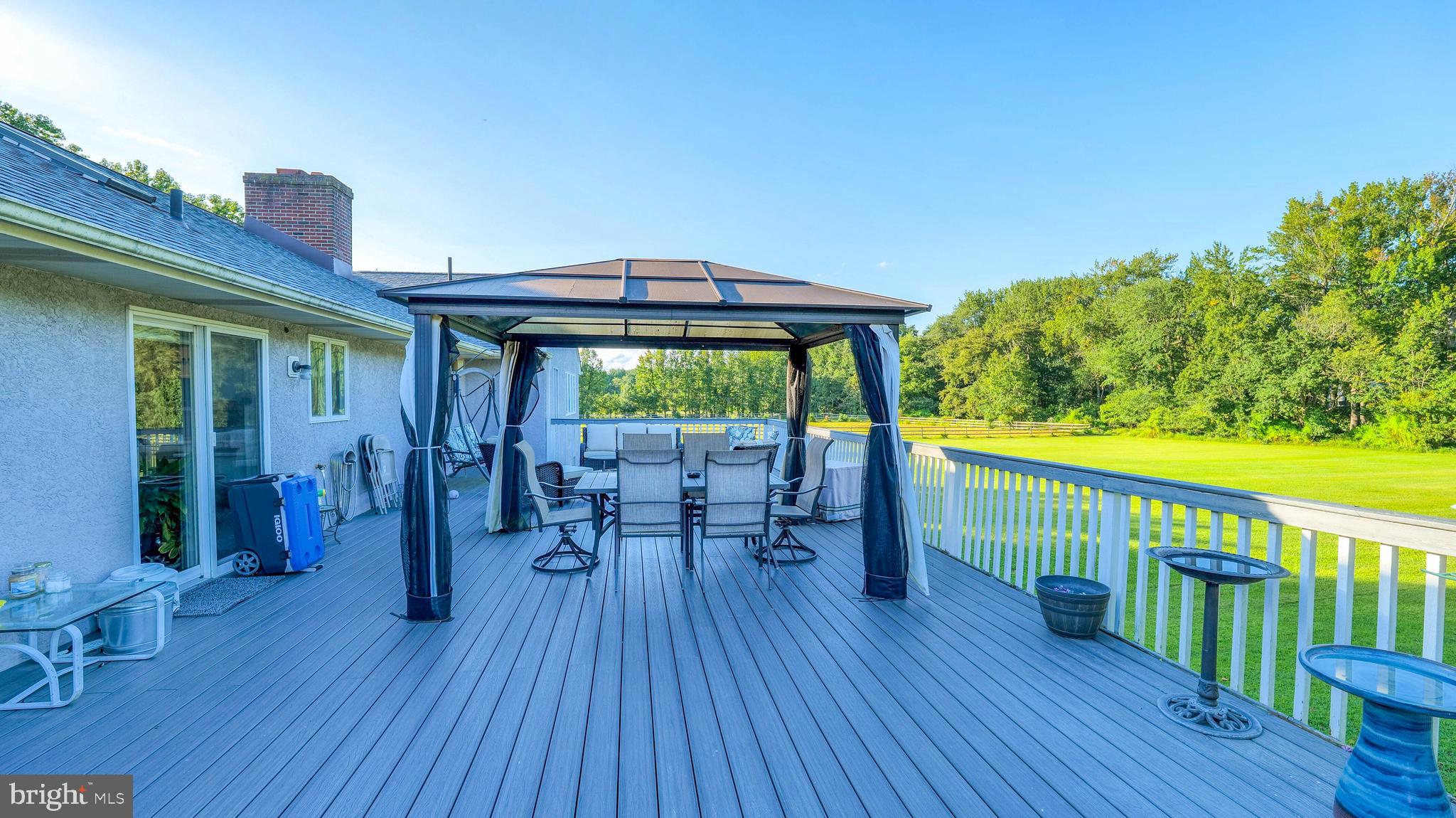 272 Hartford Road Medford, NJ 08055 - Photo 30 of 37 a view of a deck with wooden floor and outdoor seating